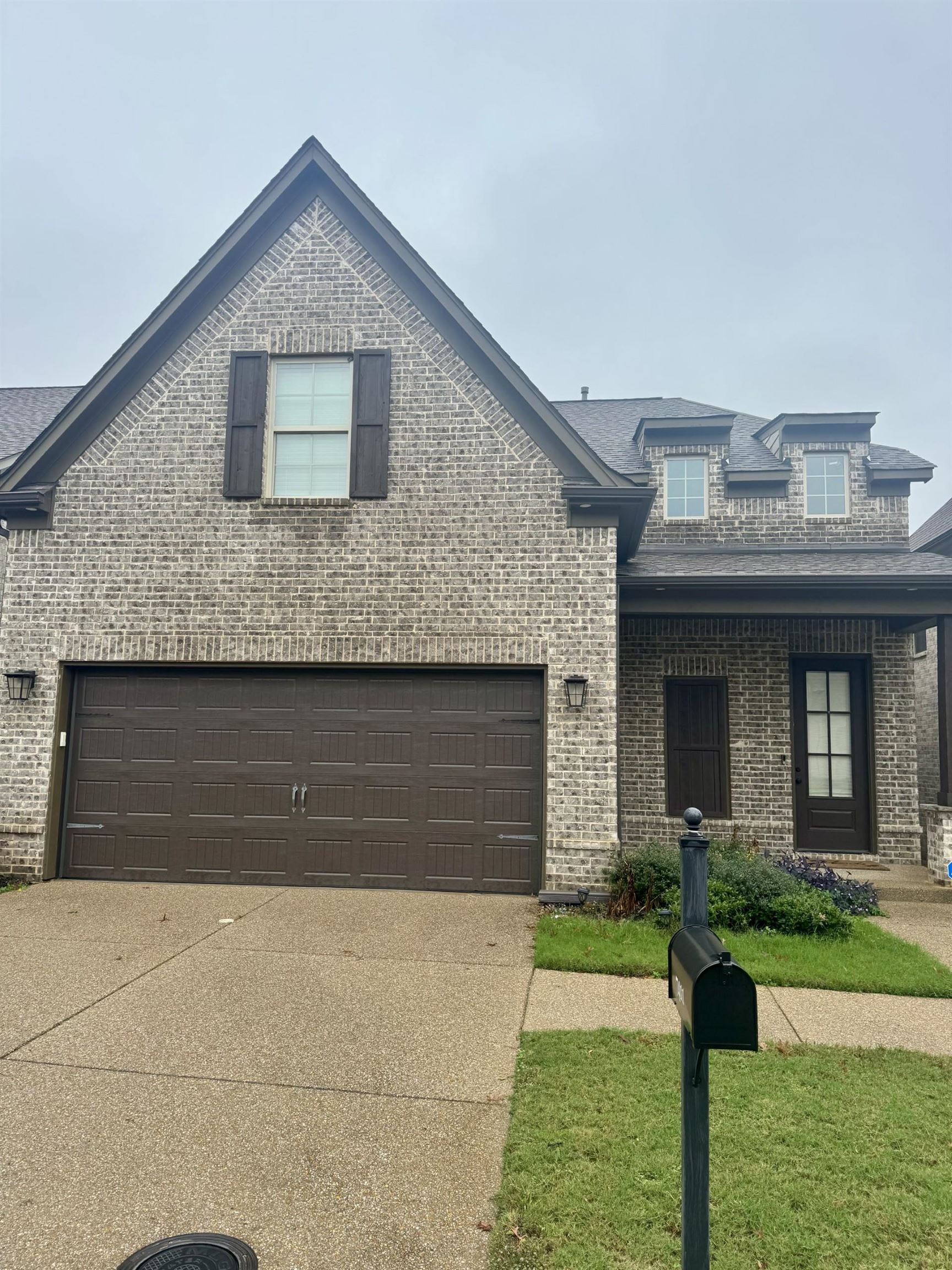 a front view of house with yard