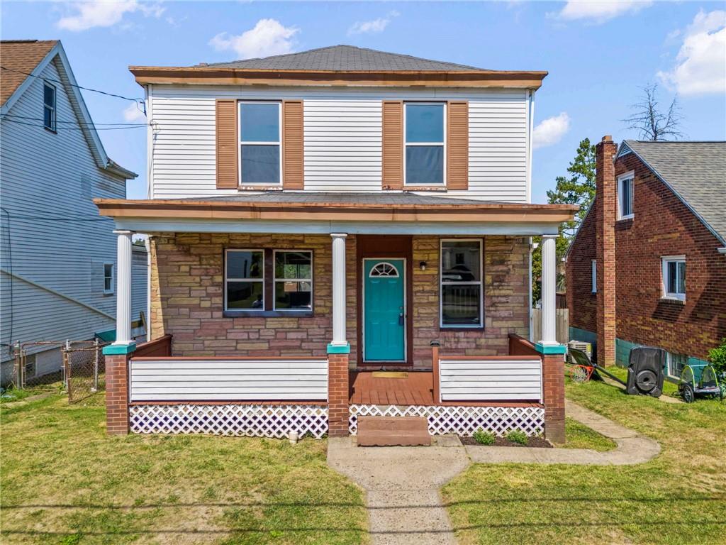 front view of a house with a patio