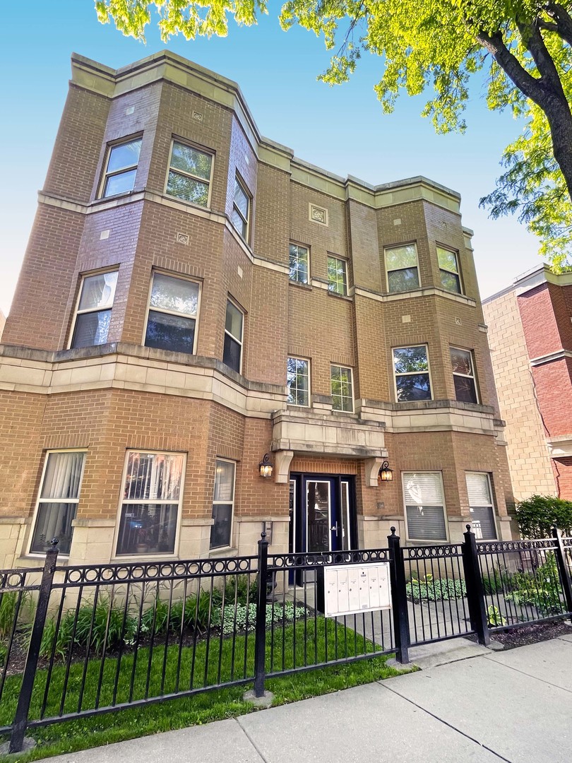 a front view of a multi story residential apartment building