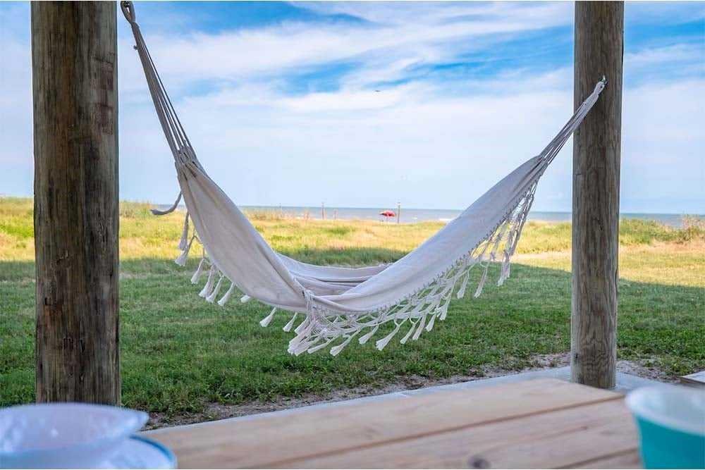 This could be what you have waiting for you under your home by the coast! Come hang your hammock on your own piece of heaven!