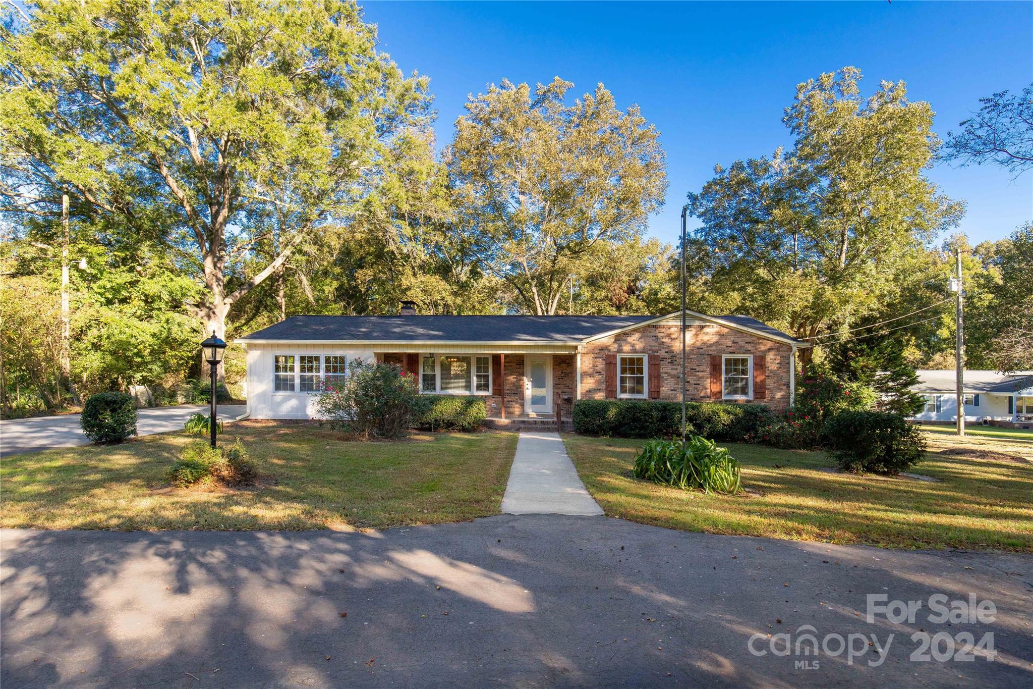 a view of a house with a big yard