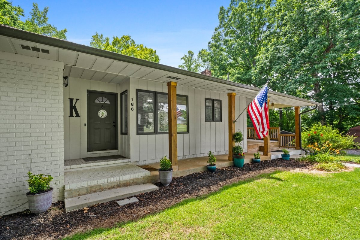 a view of backyard with deck