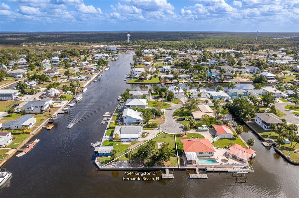 an aerial view of a houses with outdoor space