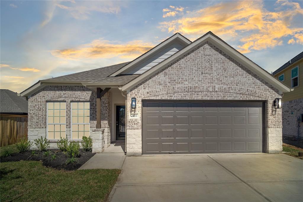 Welcome home to 29211 Live Tree Court located in Forest Village and zoned to Conroe ISD.