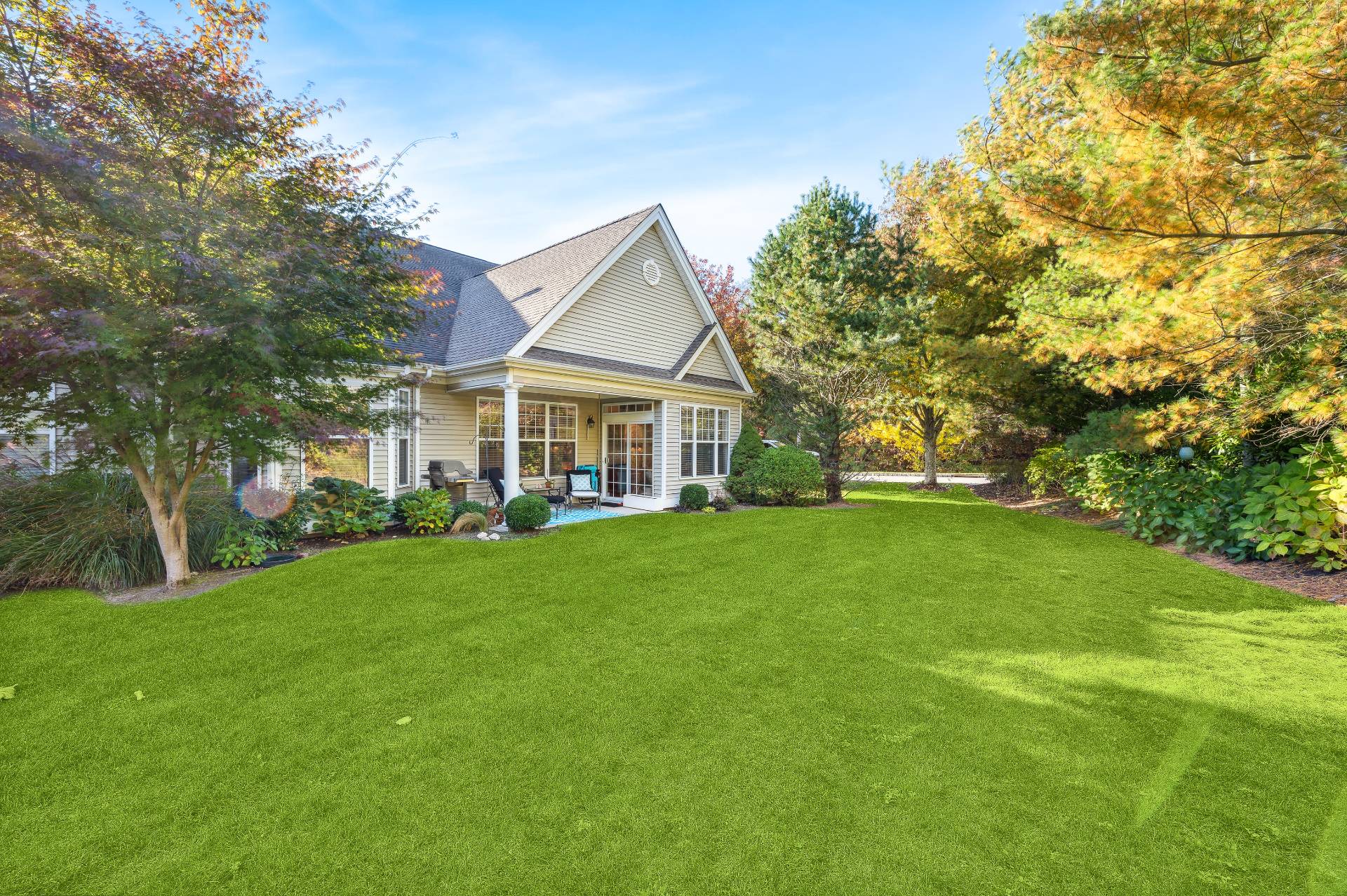 a front view of a house with a yard