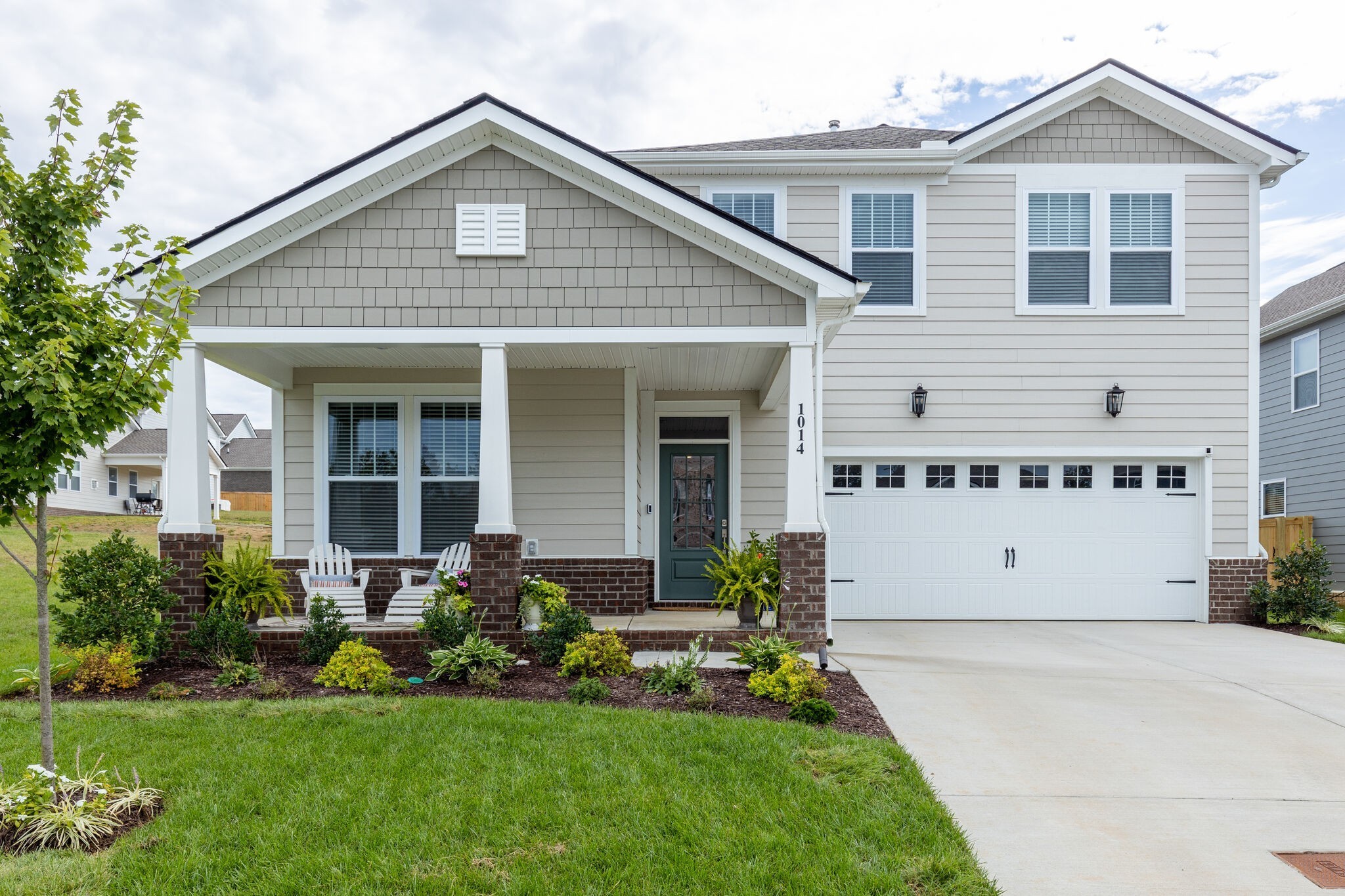 a front view of house with yard