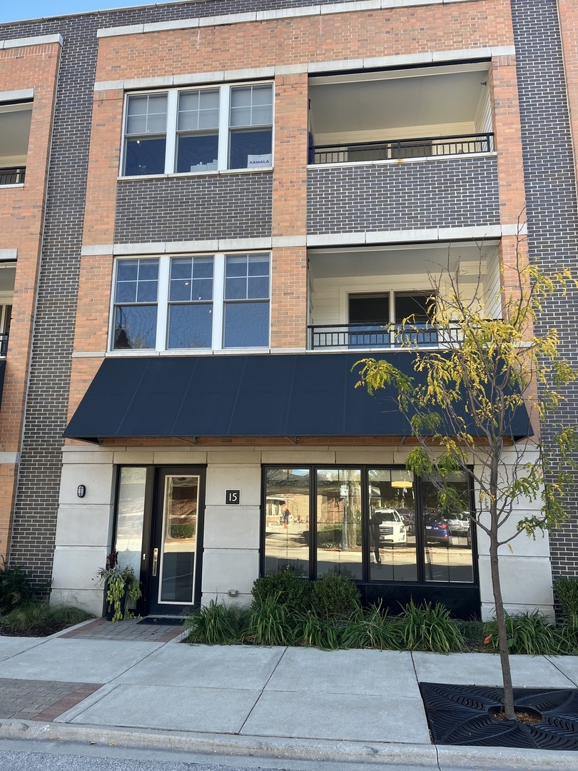 a front view of a multi story residential apartment building