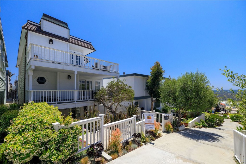 front view of a house with a small yard