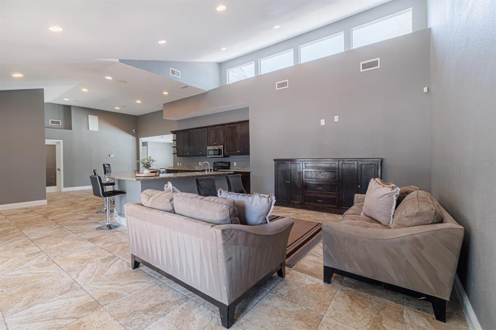 a living room with furniture and a couch