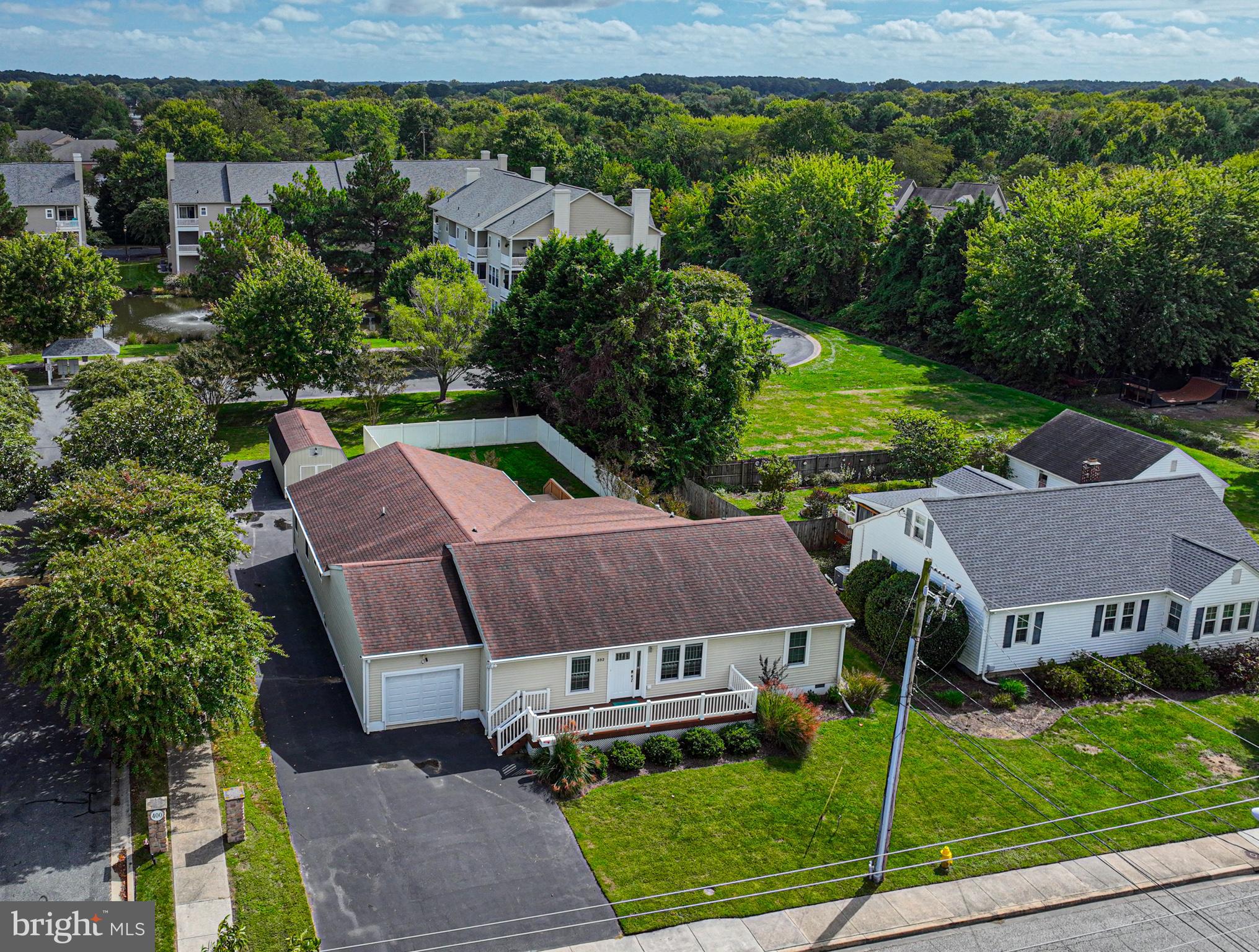 an aerial view of a house with a garden