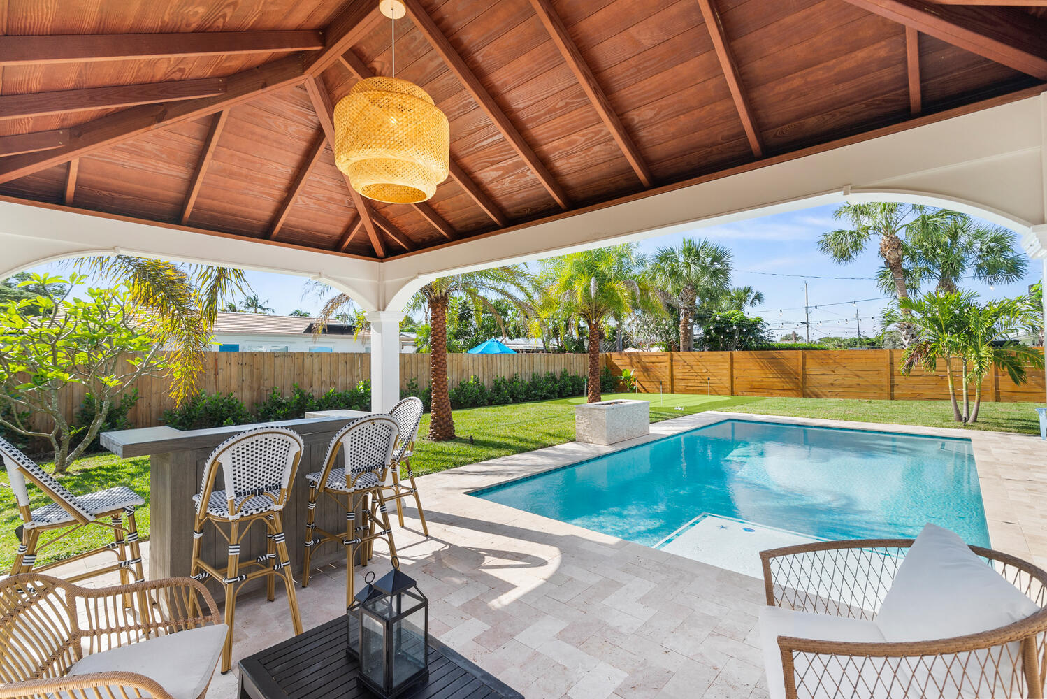 a view of swimming pool with a patio