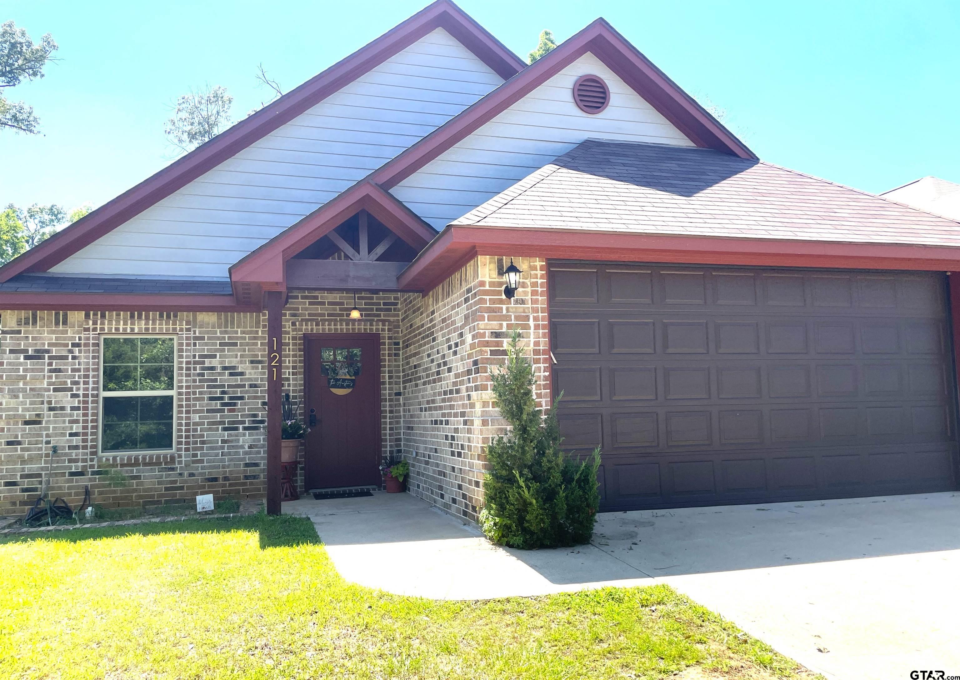 a front view of house with yard