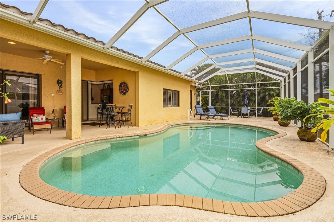 a view of a house with swimming pool