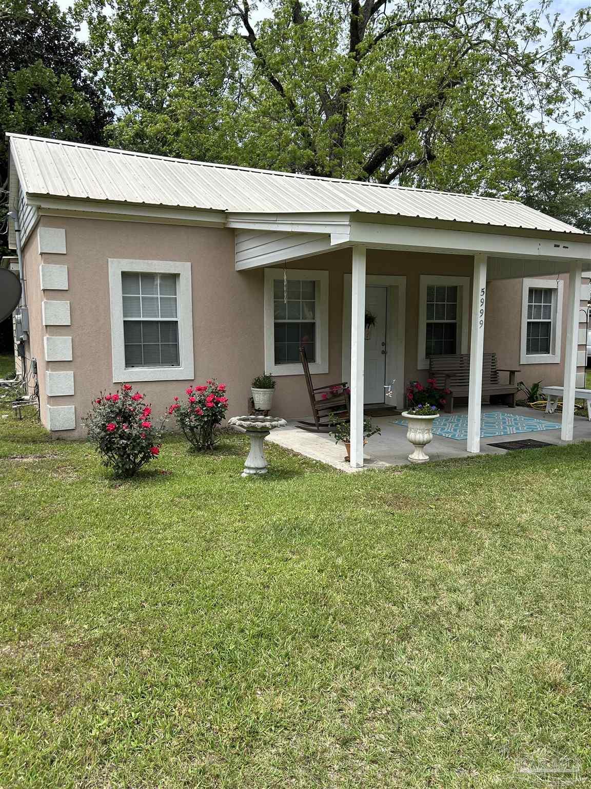 a front view of house with yard