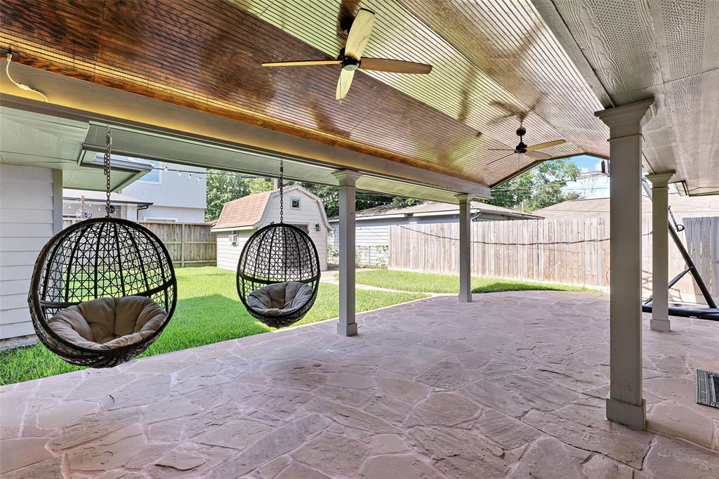 a view of swimming pool with a backyard