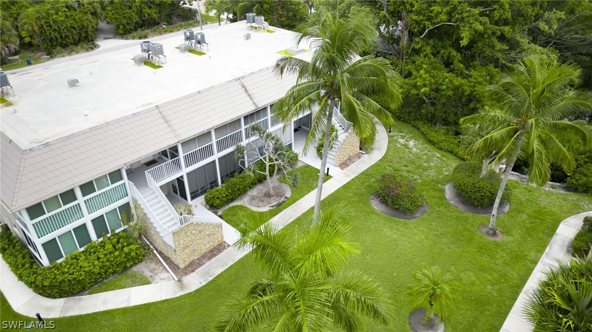 a view of swimming pool with a yard