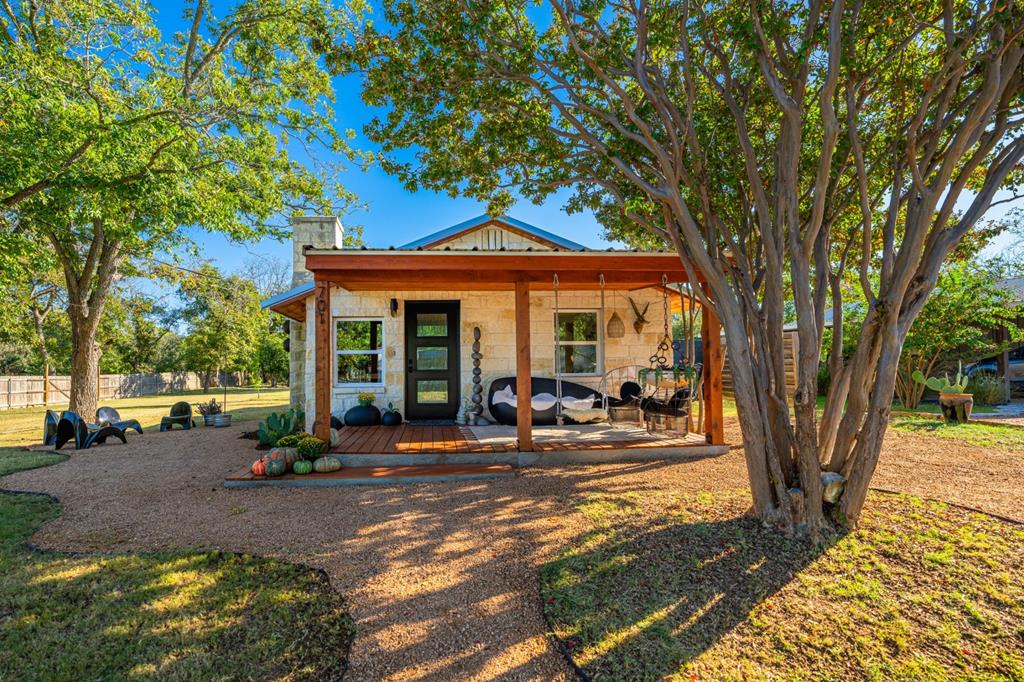 a front view of a house with patio