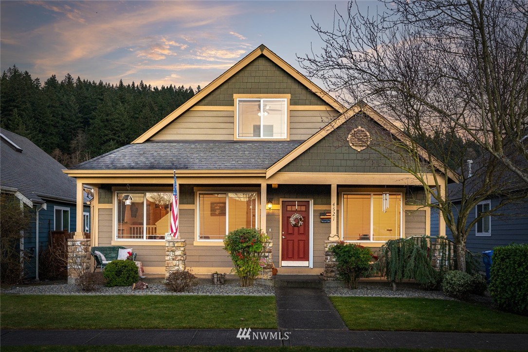 front view of a house and a yard