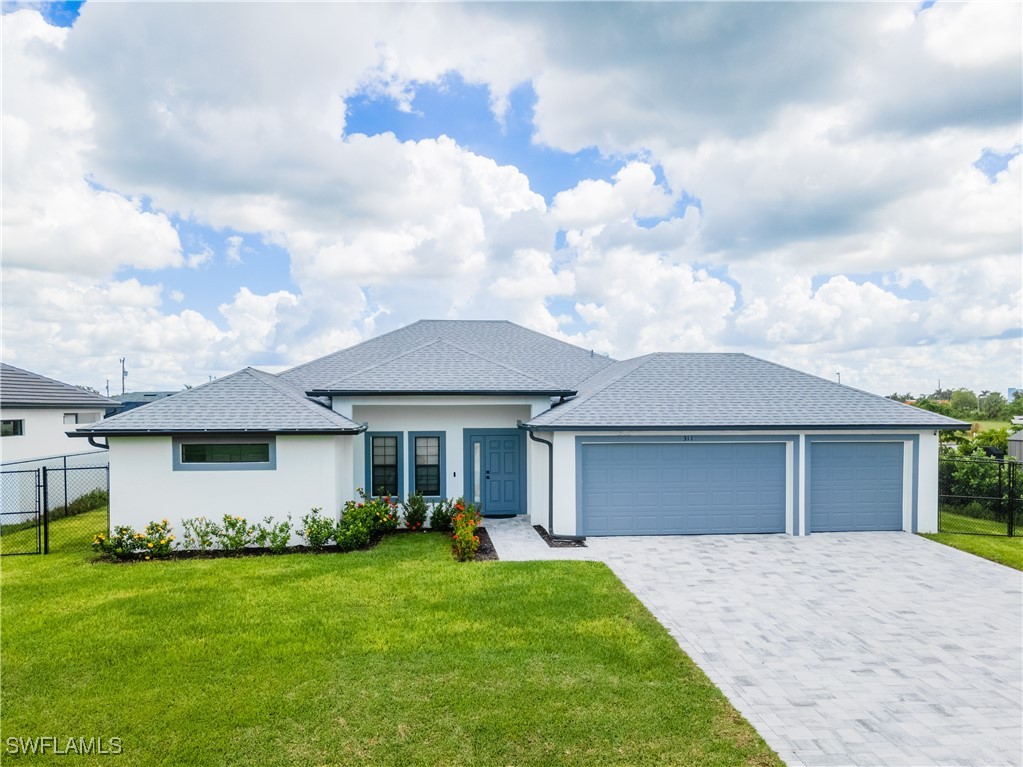 front view of a house and a yard