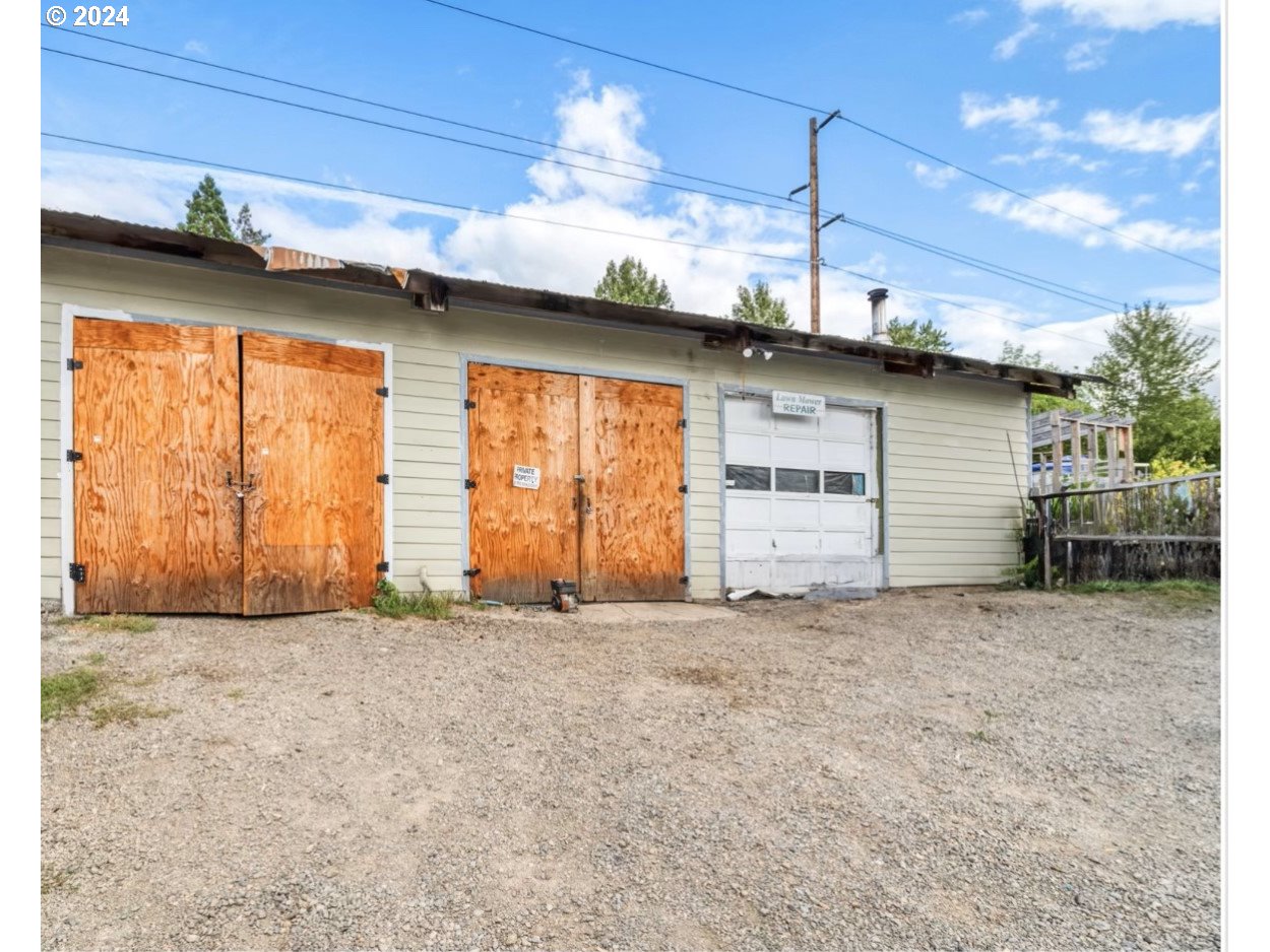 a view of a house with a garage