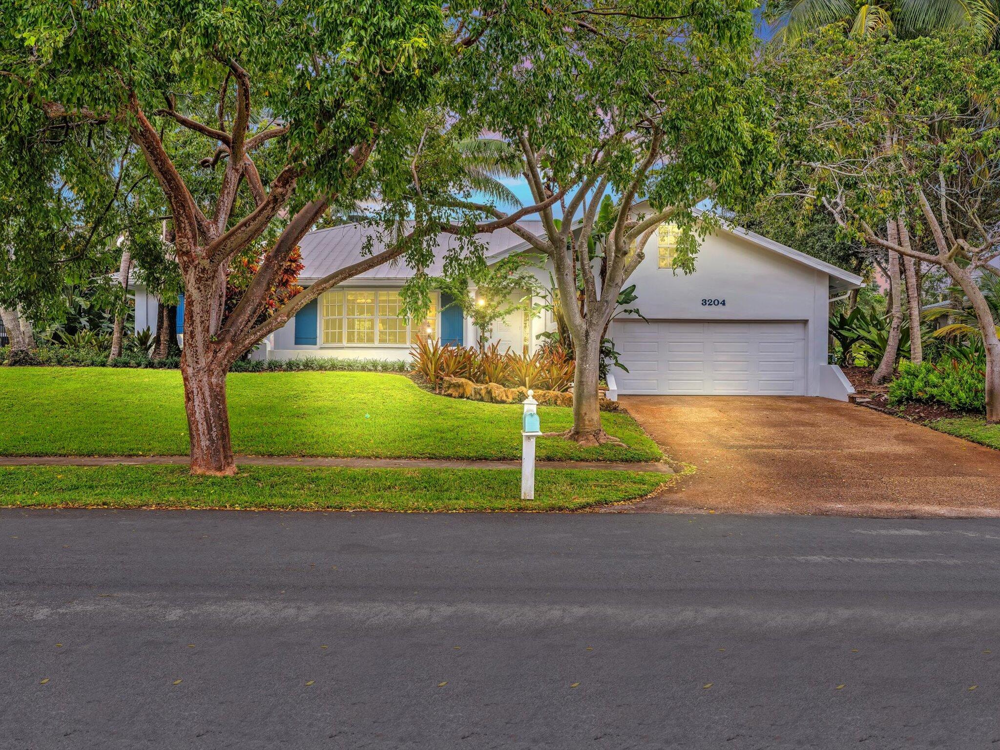 a view of a yard in front of a house