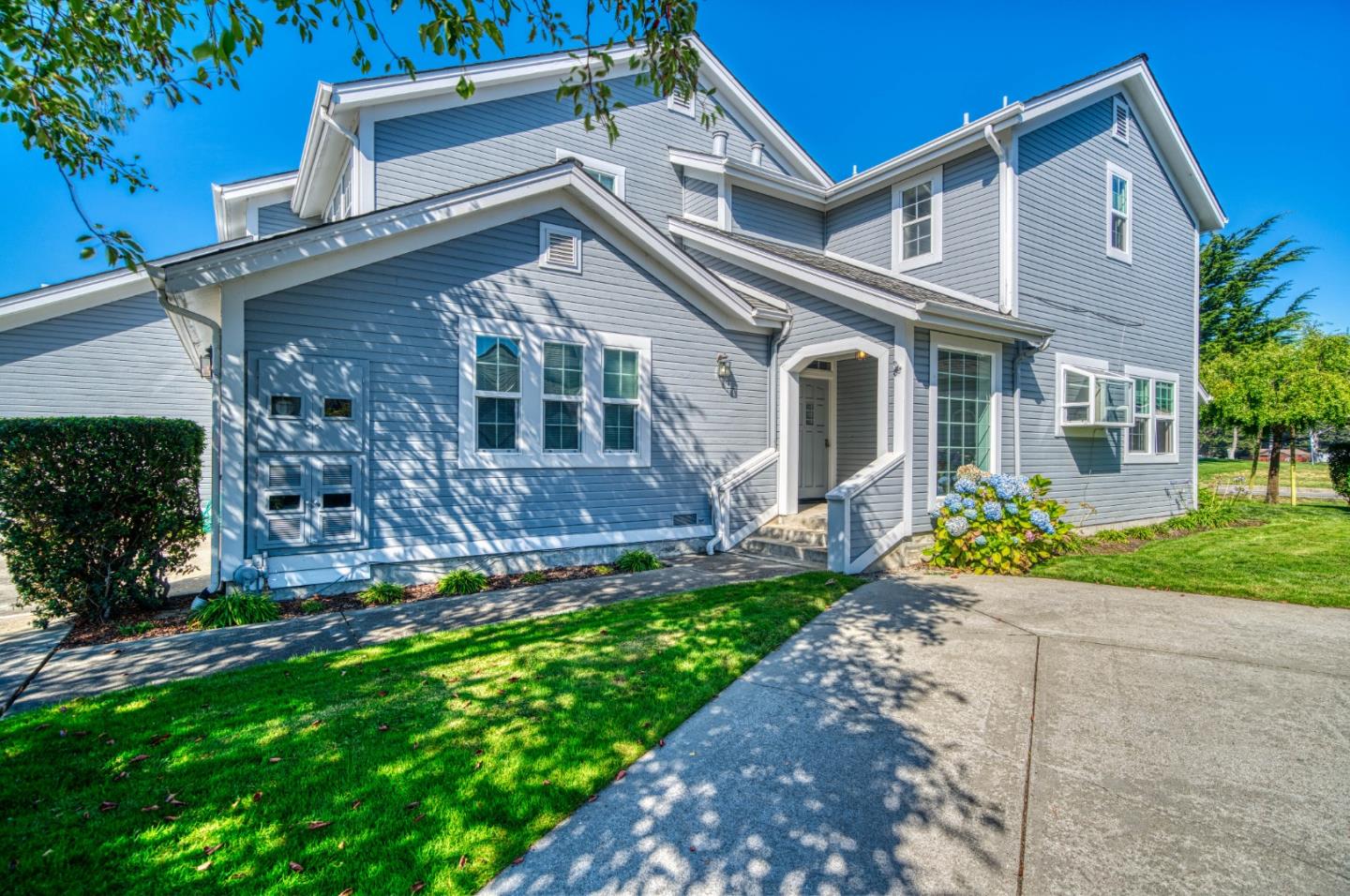 front view of a house with a yard