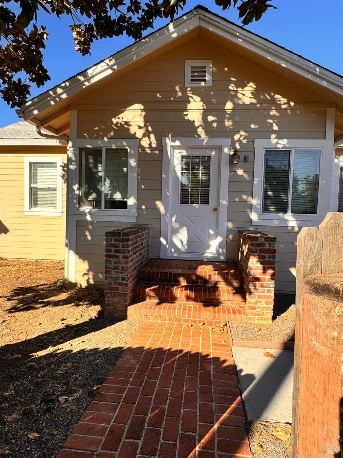 a view of a house with a patio