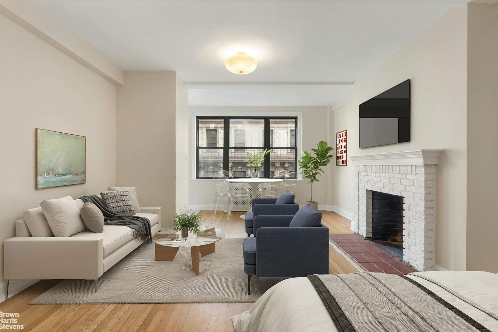 a living room with furniture and a fireplace