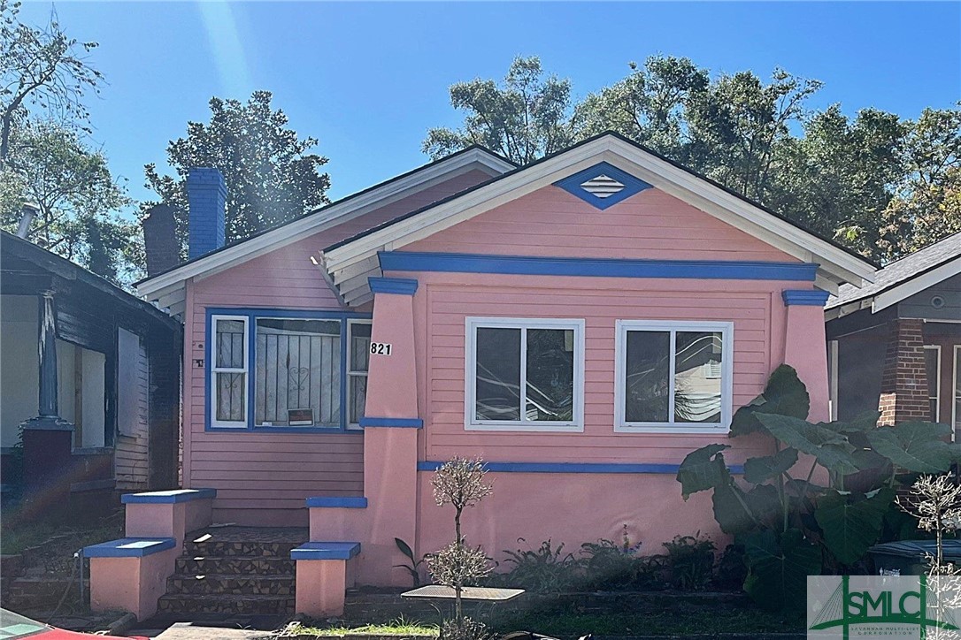 Partially renovated, one-story, 1925 cottage home.