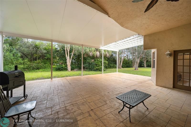 a view of a room with furniture and a yard