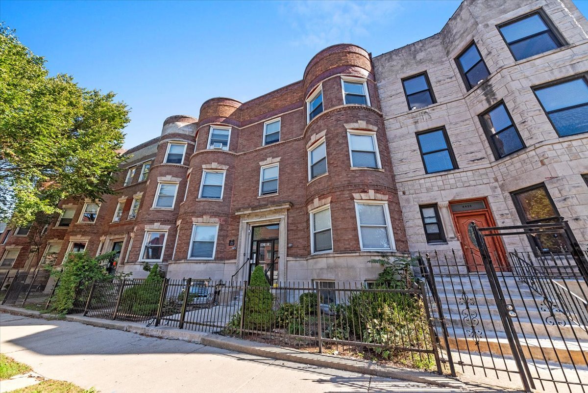 a front view of a multi story residential apartment building