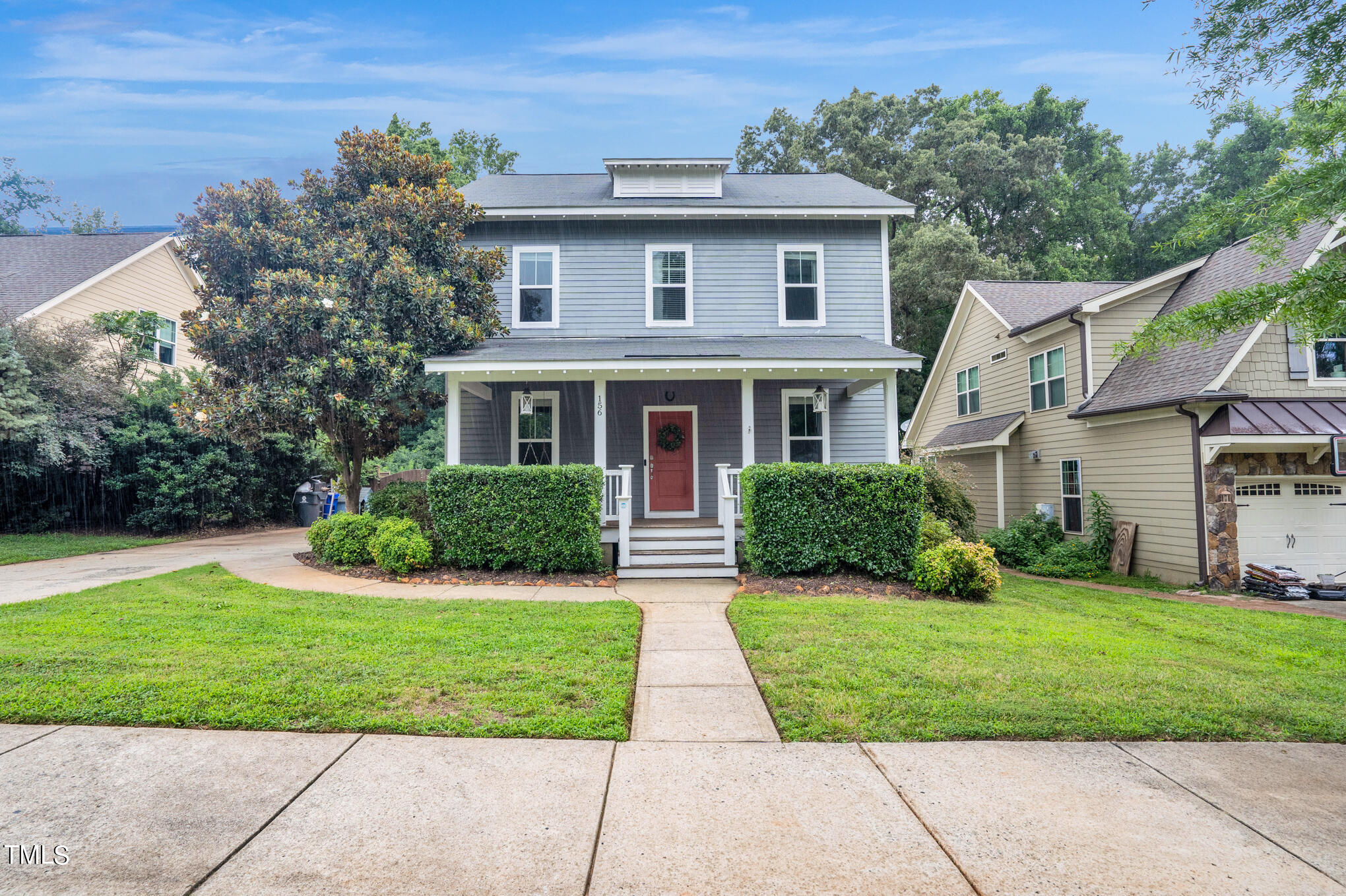 front view of a house and a yard