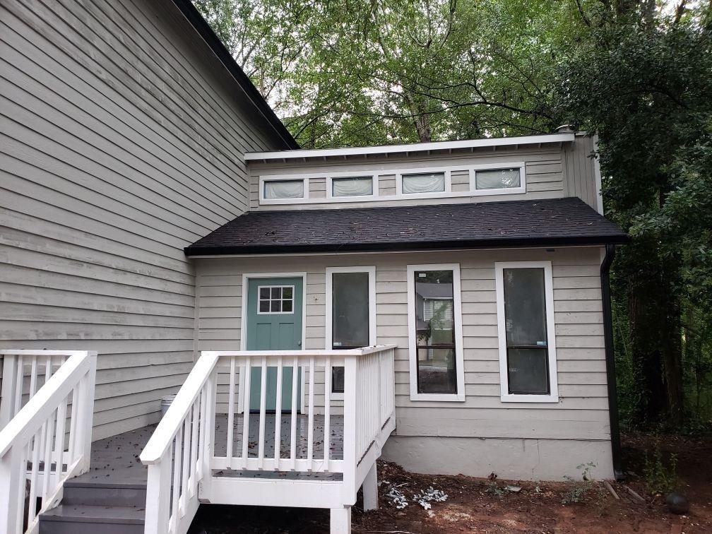 a view of a house with a deck