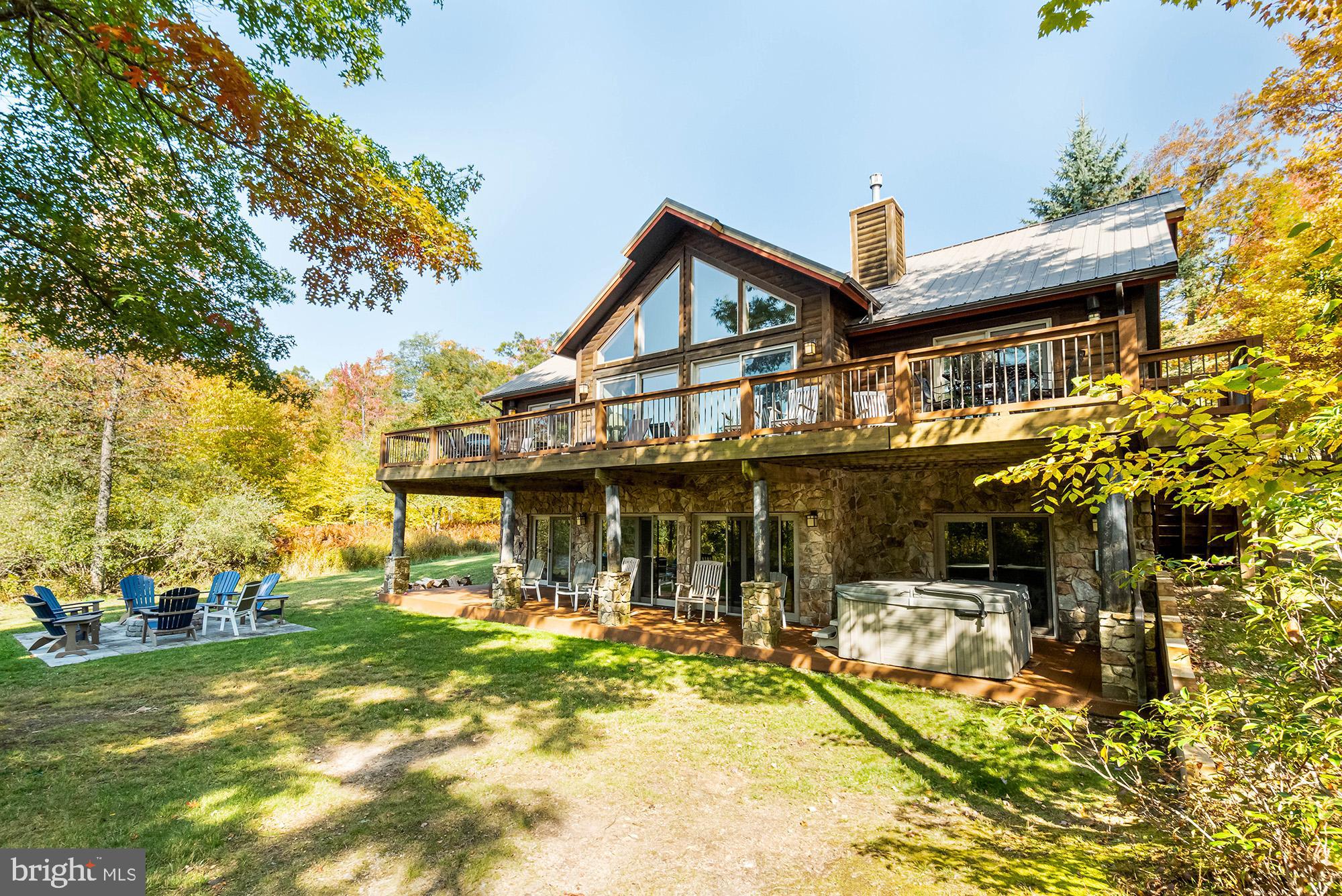 a front view of a house with swimming pool