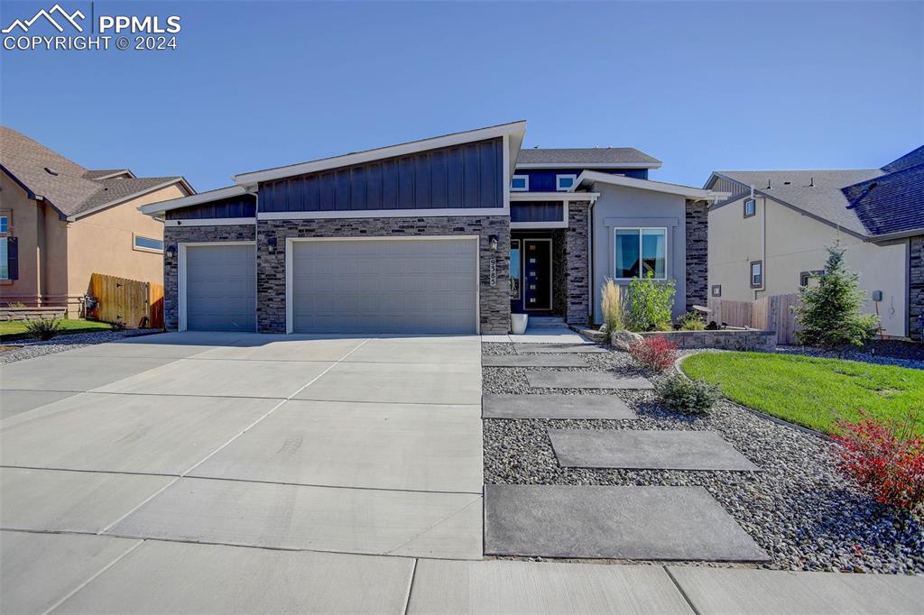 View of front of property with a garage