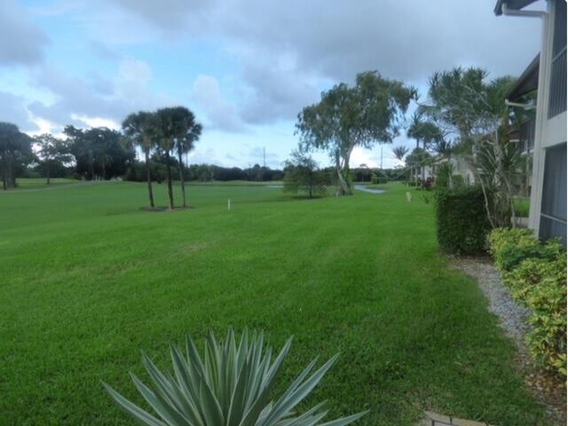 a view of a golf course with a garden