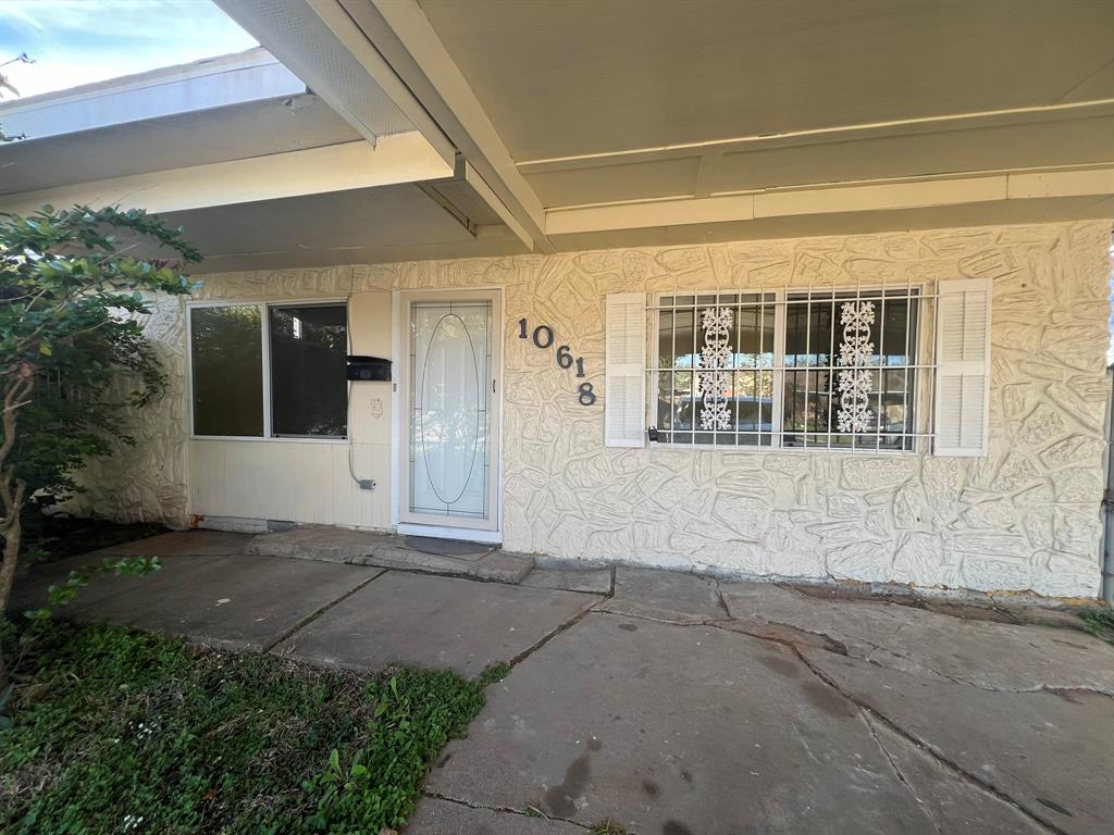 a front view of a house with a garage