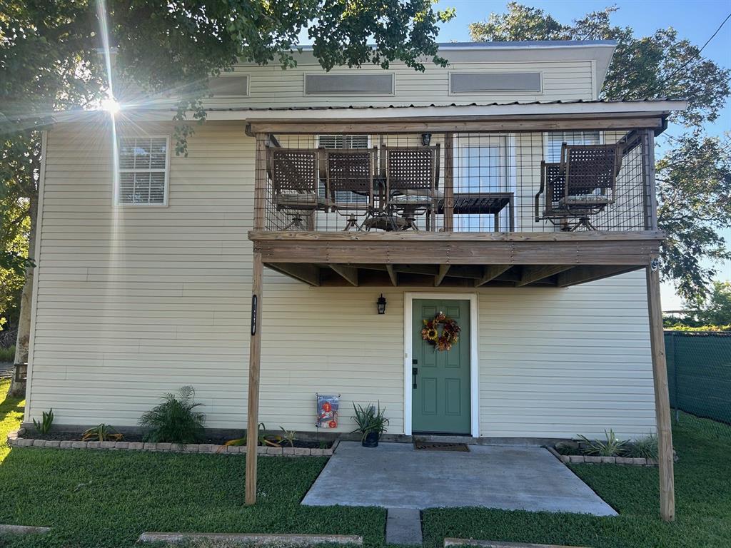 a view of house with outdoor space