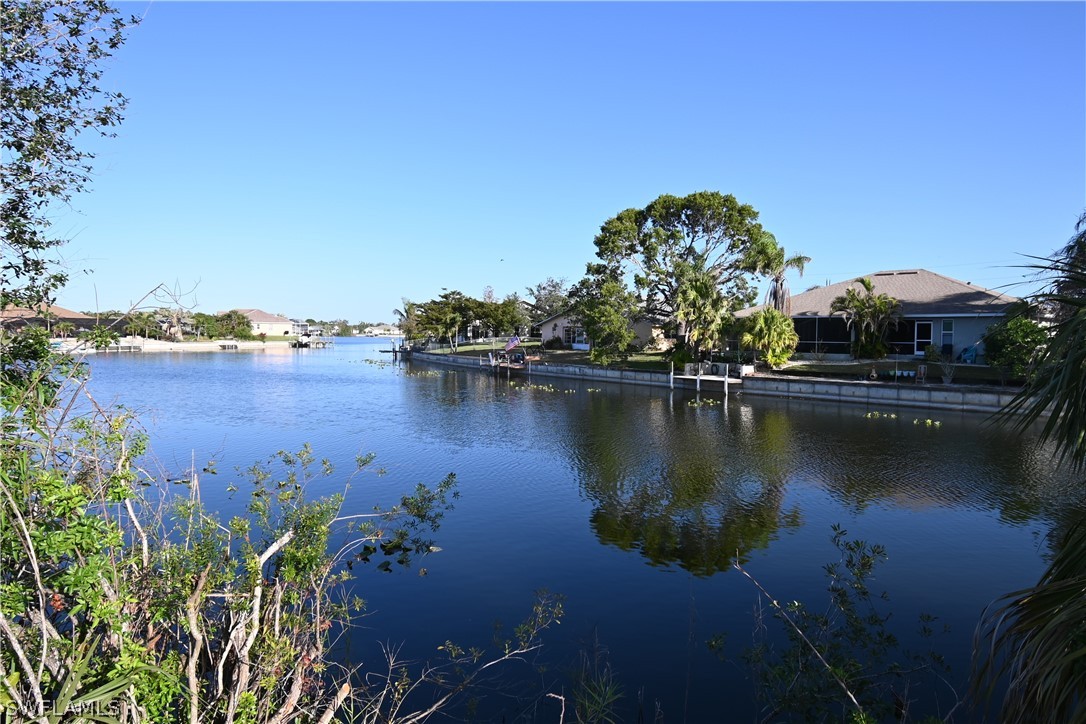 view of a lake with houses