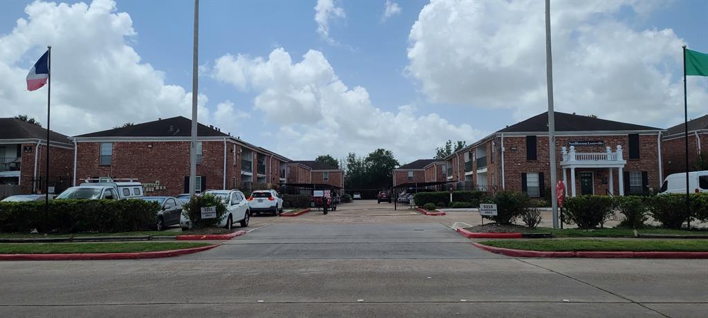 a front view of a houses with street