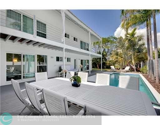 a view of outdoor space yard deck patio and fire pit