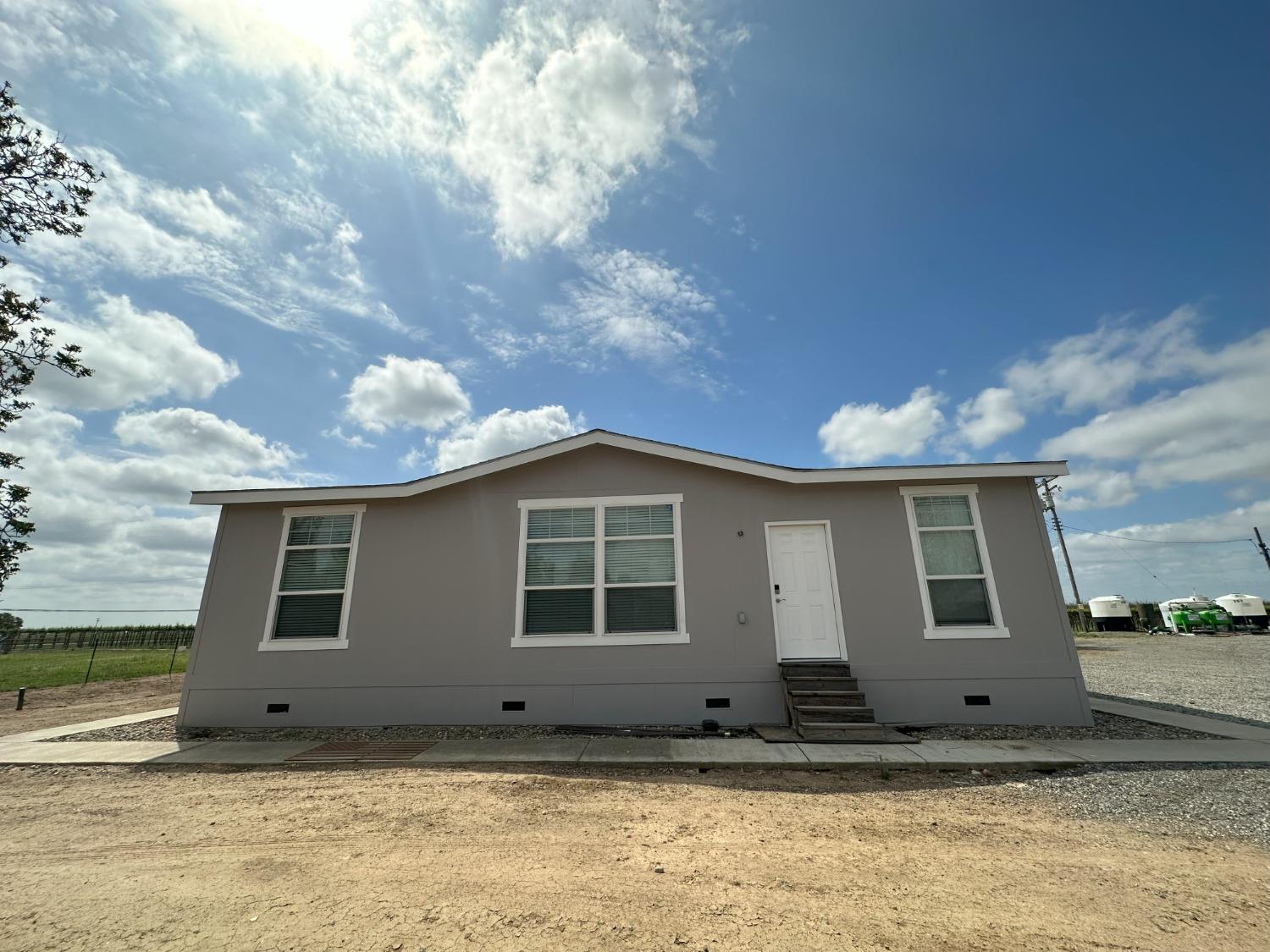 a front view of a house with windows