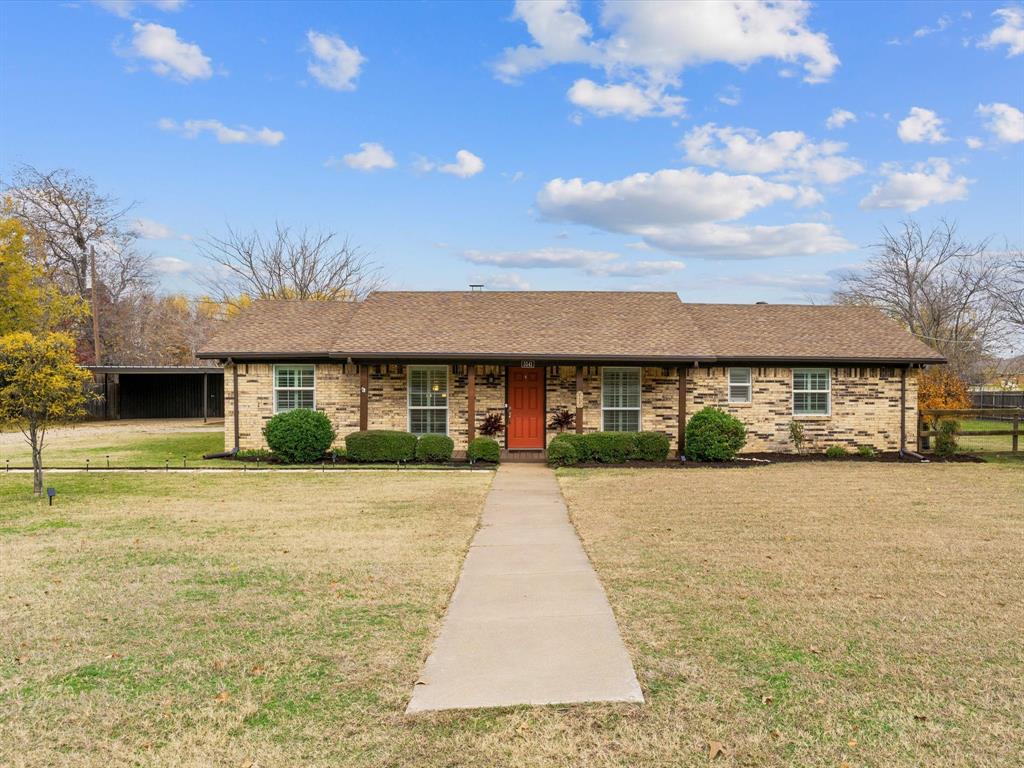 a front view of house with yard