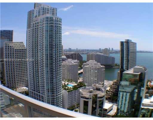 a view of city with tall buildings