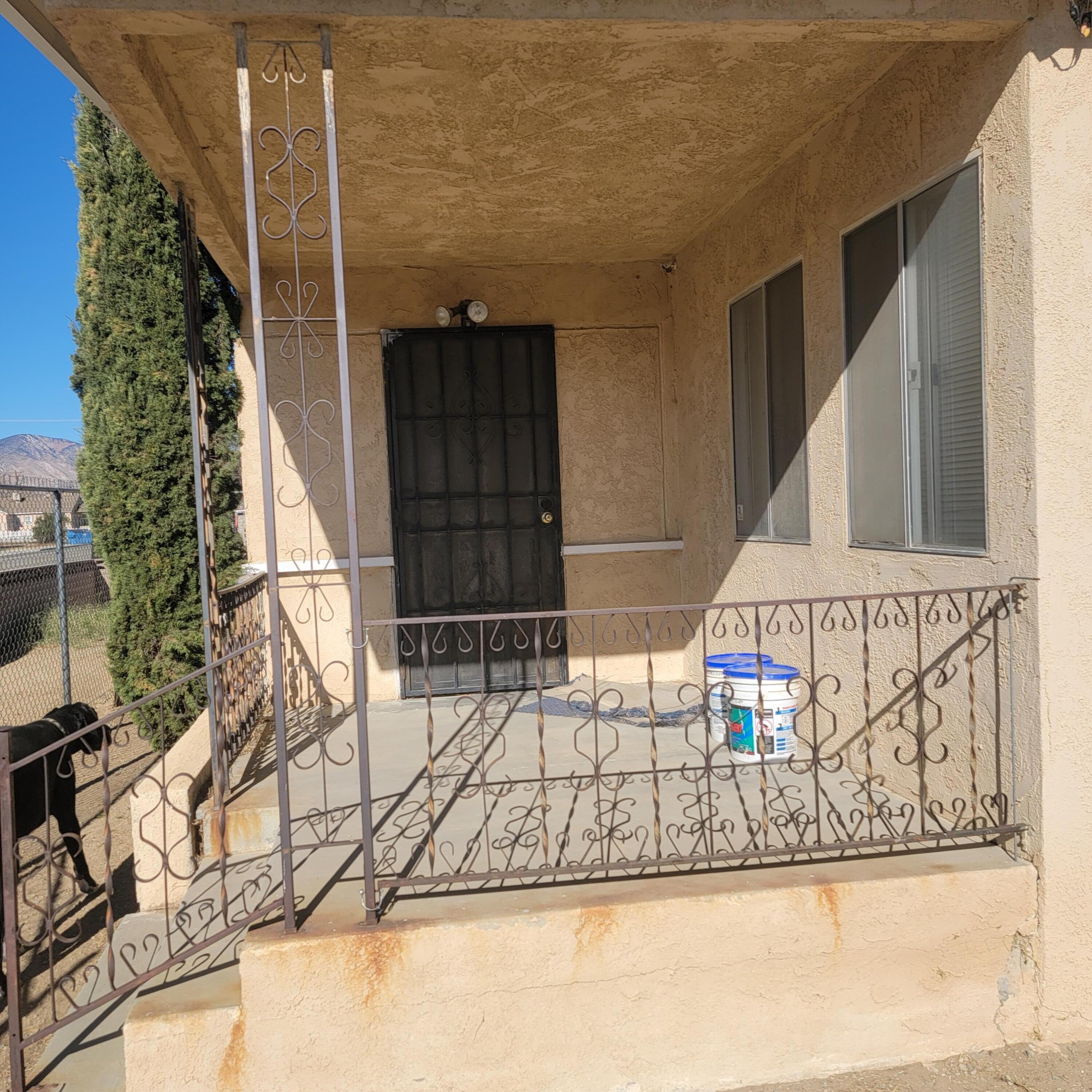 a view of entryway with a front door