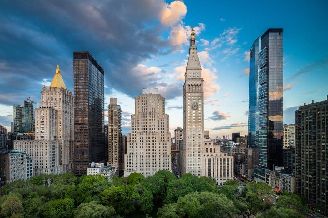 a view of a city with tall buildings