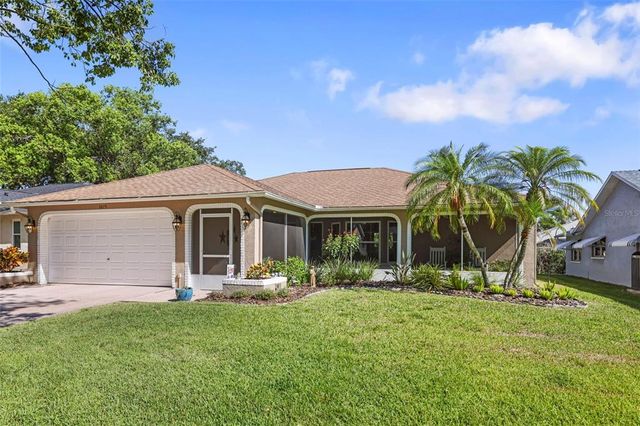 Homes for Sale with Pool in Highland Lakes, Palm Harbor, FL | Compass