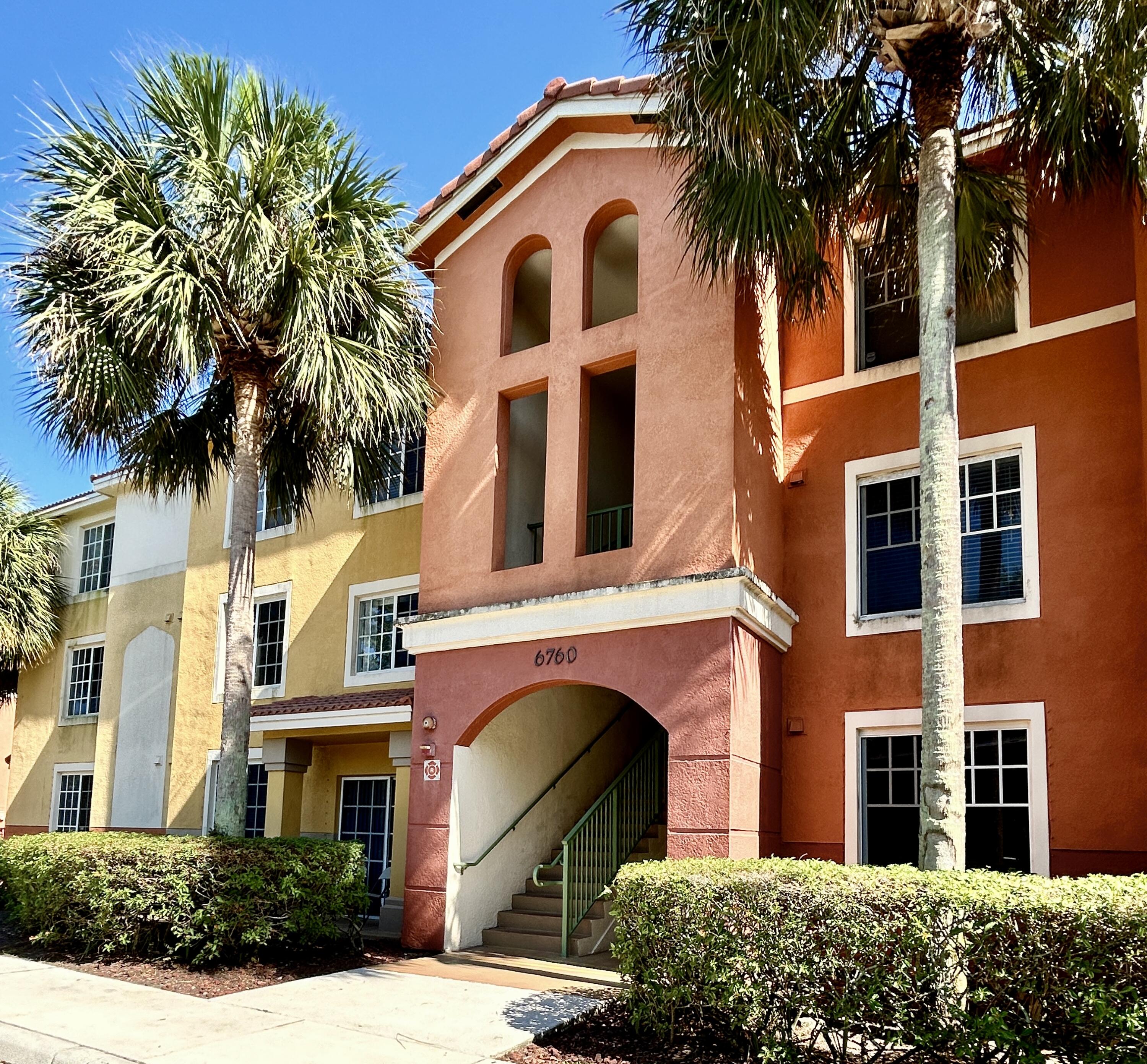 a front view of a multi story residential apartment building