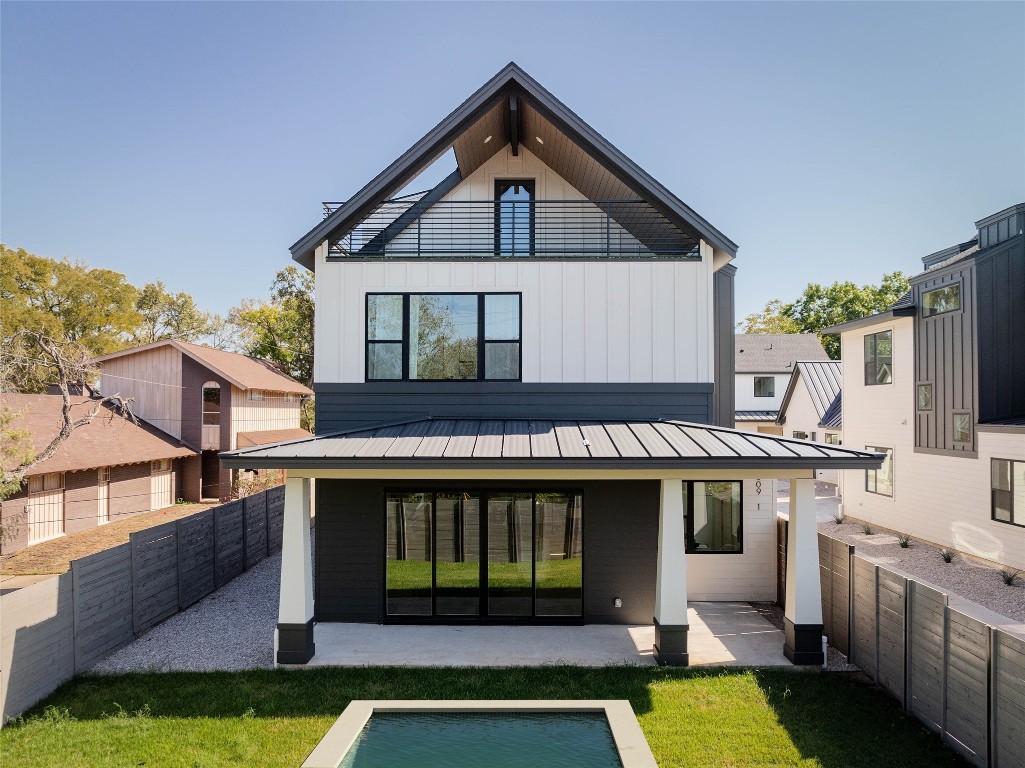 a view of a house with roof deck