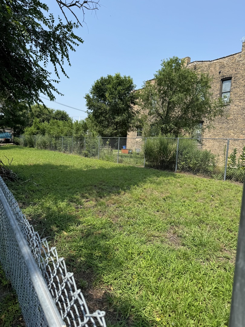 a view of a yard with an trees